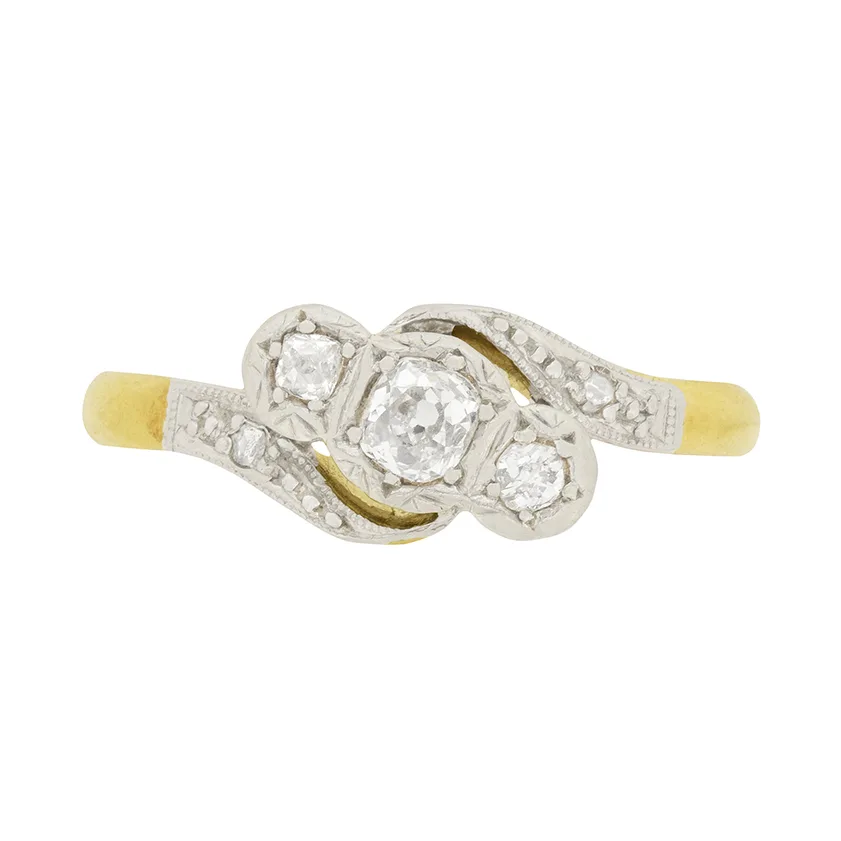 Edwardian 0.25ct Diamond Three Stone Crossover Ring, c.1910s