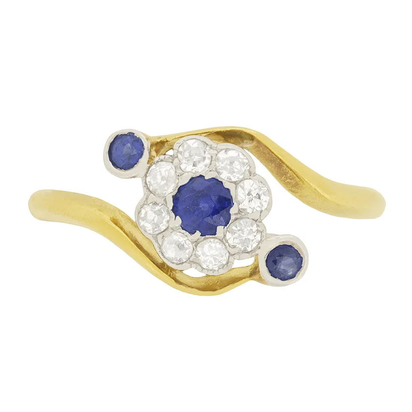 Edwardian 0.15ct Sapphire and Diamond Daisy Twist Ring, c.1900s